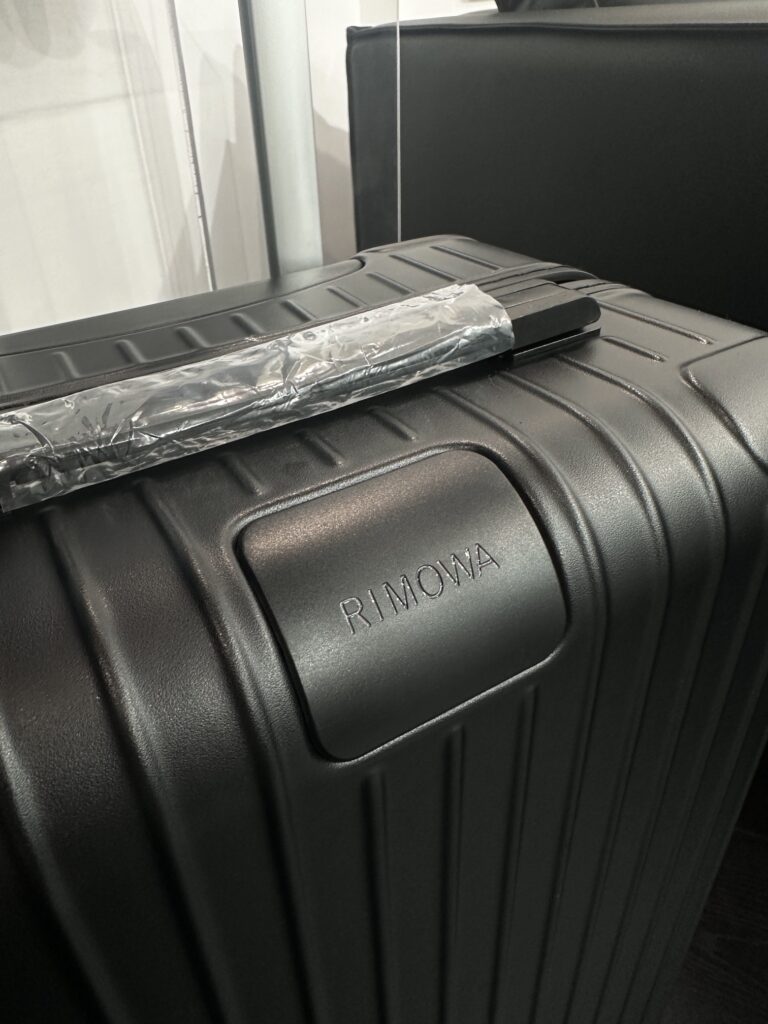 Matte Black 21-Inch Travel Suitcase