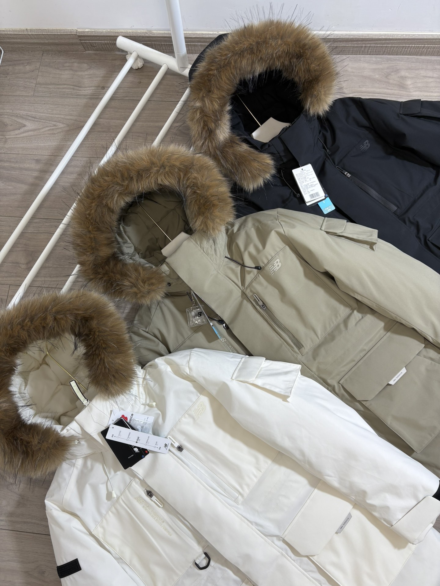 NB mid length down jacket